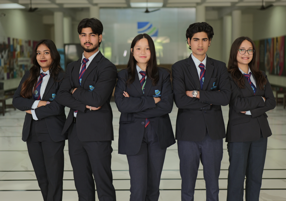 Uttaranchal University students standing confidently on campus